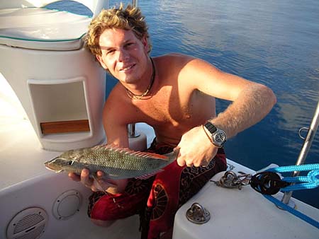 07 Chris with purchased fish, Uligan, Maldives